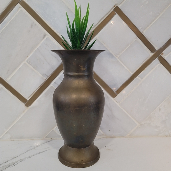 Vintage aged antiqued brass vase. It's about 7.5